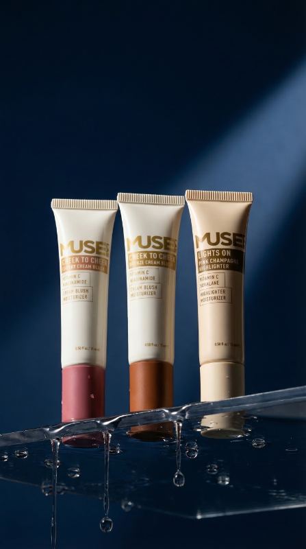 Muse Lab — model in soft light holding serum